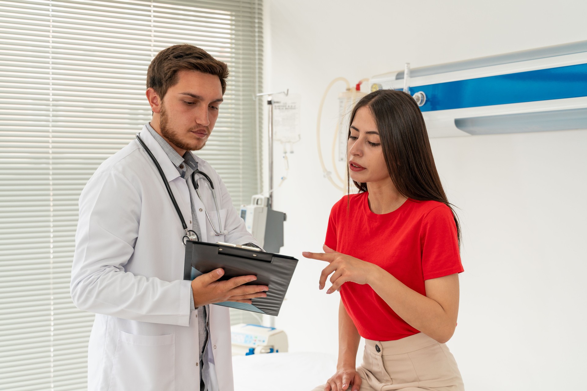 Shot of a doctor and her patient discussing her results